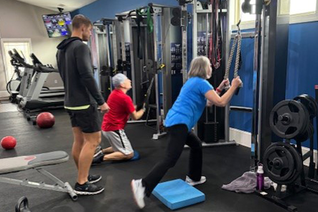 Cody a personal trainer working with patient