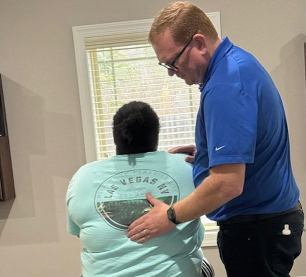 Dr. Blake Derrick attend patients back pain