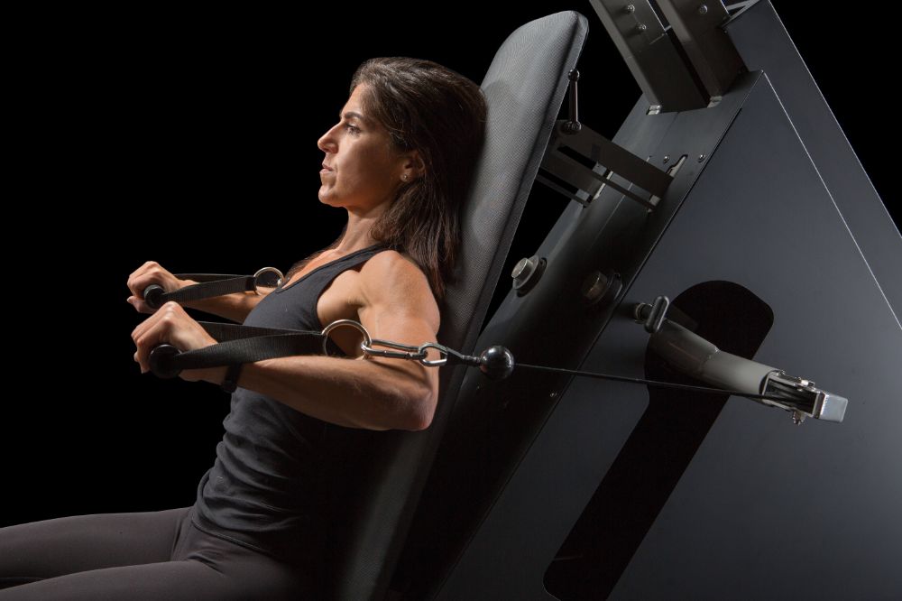 woman exercising her biceps