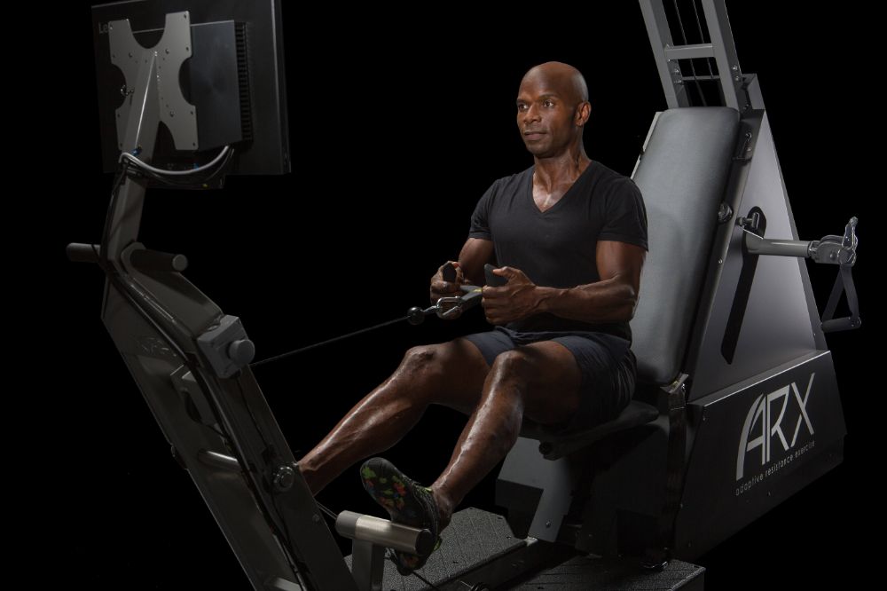 man in AXR fitness tool, exercising
